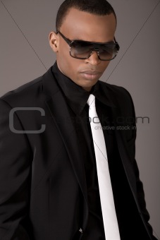 Serious black business man with sunglasses