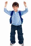 school boy raising his hands up wearing school bag