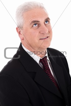 Portrait of thinking senior, business man