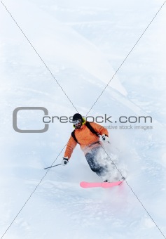 Freeride skier in powder snow