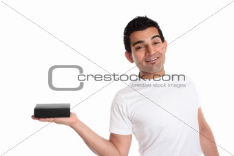 Man holding a product merchandise in one hand