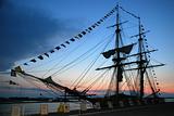 Silhouette of Tall Ship at sunset