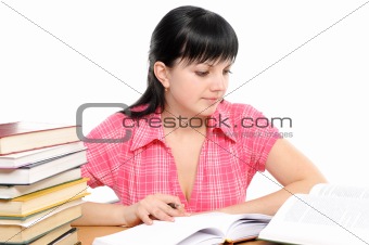 Girl doing homework on a white background