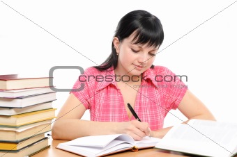 Girl doing homework on a white background