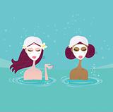 Spa girls relaxing in water pool