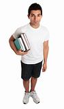 Male college student standing with textbooks under one arm