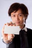 Asian business man with white card