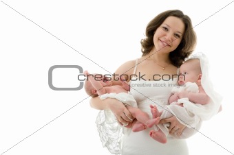 Smiling mother with baby girl and boy