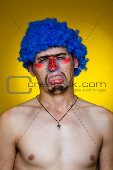 Clown in a blue wig