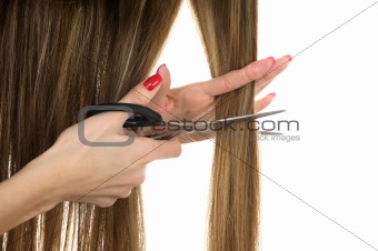 scissors trying to cut long hair