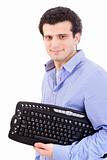 man with keyboard under is arm