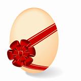 Realistic illustration by Easter egg with red bow