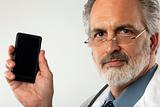 Doctor Holding up Cell Phone