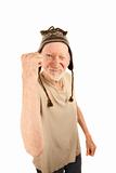 Senior man in knit cap shaking fist