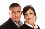 Skeptical or angry Hispanic couple
