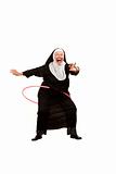 Nun playing with plastic hoop