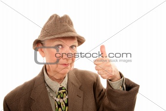 Senior woman in drag giving thumbs up gesture