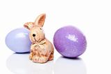Cute little Easter bunny with two colourful Easter eggs
