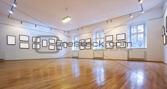 Art gallery with blank pictures