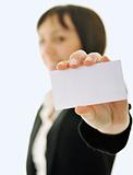 young business  woman displaying empty business card
