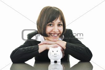 business woman putting coins money in piggy bank