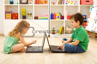 Kids playing computer games