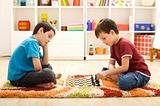 Let me show you a move - kids playing chess