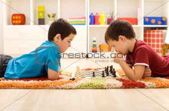 Kids playing chess