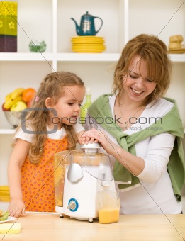 Making fruit juice with mom