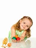 Adorable little girl with easter eggs and chicken - isolated