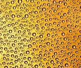 Water drops on a golden texture