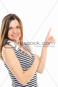  Happy young woman pointing at copy space