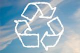 Recycle symbol on blue sky