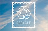 Recycle symbol on blue sky