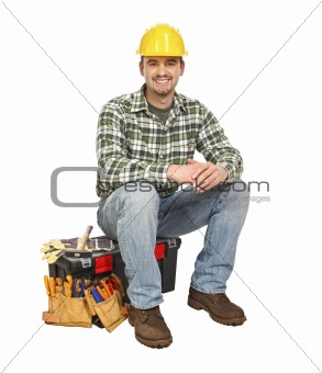 young manual worker and toolbox