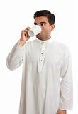 Arab man drinking coffee