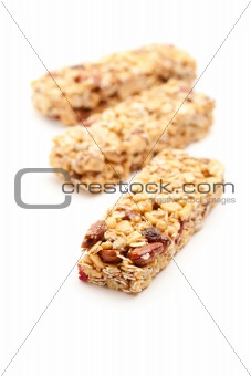 Three Granola Bars Isolated on a White Background with Narrow Depth of Field.