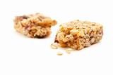 Broken Granola Bar Isolated on a White Background with Narrow Depth of Field.