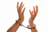 Handcuffed Woman Desperately Raising Hands in Air Isolated on a White Background.