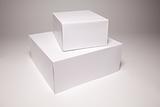 Blank White Box Isolated on a Grey Background Ready for Your Own Graphics.
