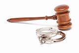 Gavel and Handcuffs Isolated on a White Background.