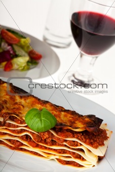 lasagna noodle dish on a white plate