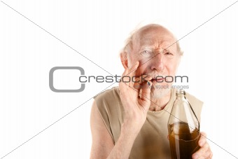 Senior man with cigarette and alcohol