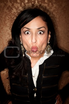 Pretty Hispanic woman making a funny face