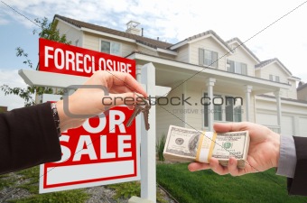Handing Over Cash For House Keys in Front of House and Foreclosure Sign.