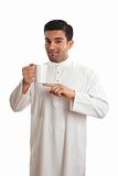 Arab ethnic man showing coffee