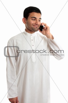 Midldle eastern ethnic man using mobile phone
