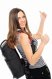 young woman with thumbs , bears a backpack,