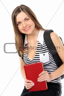  beautiful girl with a backpack, holds the book