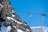 Gondola ski lift in high mountains
